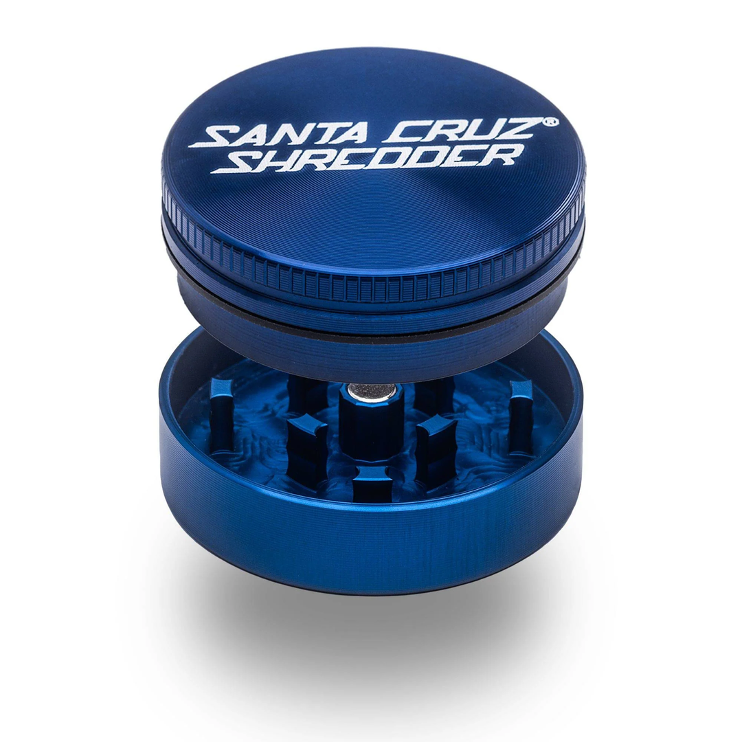 Blue Santa Cruz Shredder 2-Piece Small Grinder — open view showing precision-cut teeth and magnetic lid