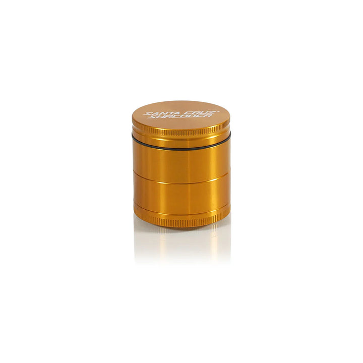 Gold Santa Cruz Shredder 4-Piece Medium Grinder – premium anodized finish with laser-etched logo.