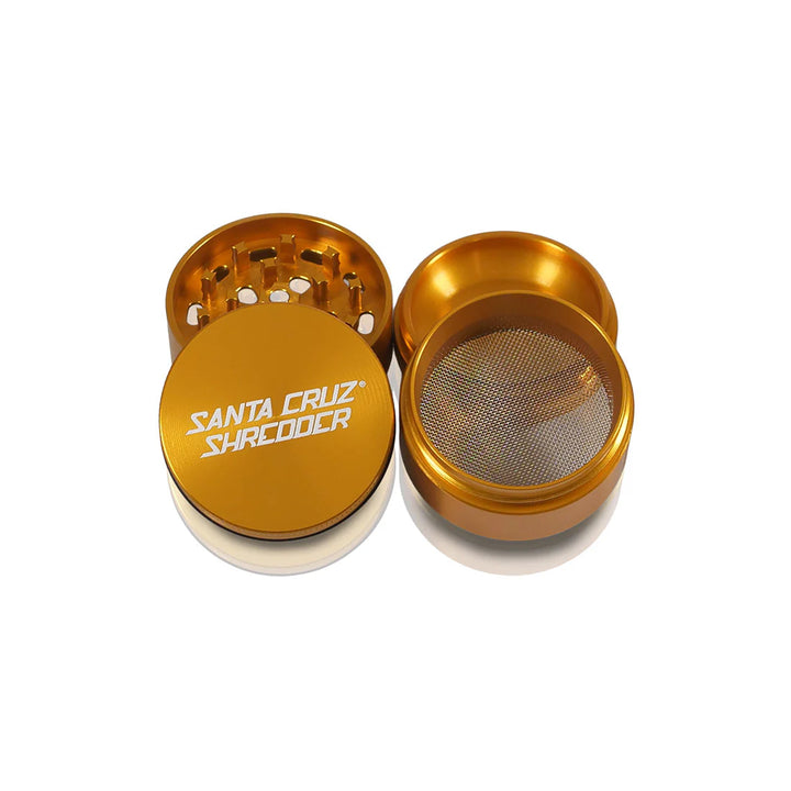 Santa Cruz Shredder 4-Piece Medium Grinder Gold – all four sections open showing pollen screen and collection chamber.
