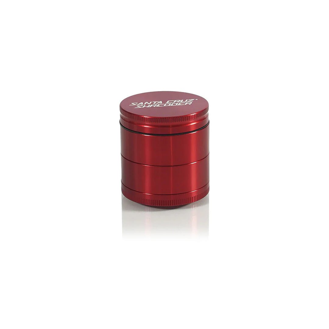 Santa Cruz Shredder Medium Grinder in Red with anodized metal finish.