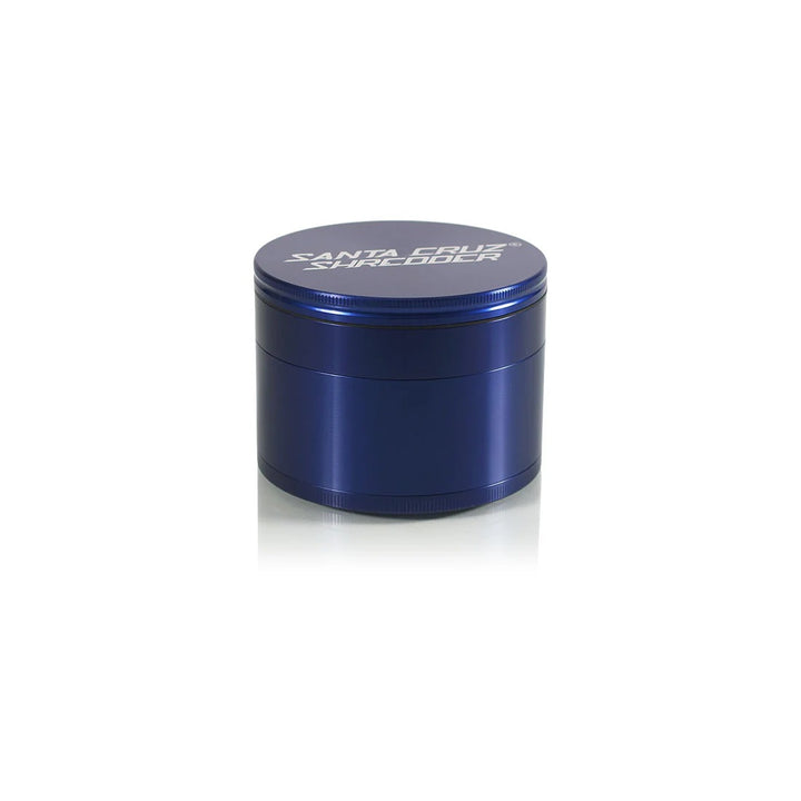 Side profile of blue jumbo aluminum herb grinder with magnetic lid