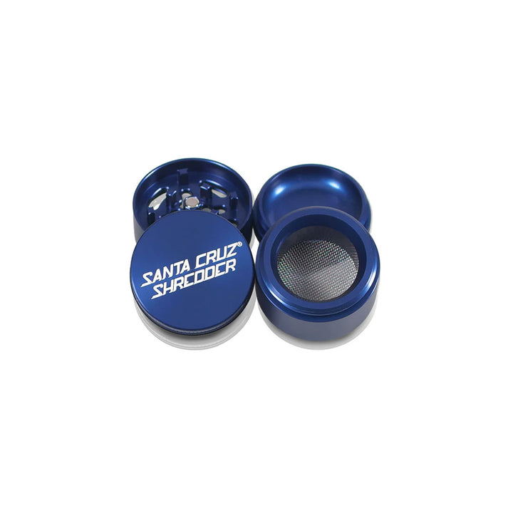 Cruz Shredder Small 4-Piece Grinder in Blue with laser-etched logo and durable anodized coating.