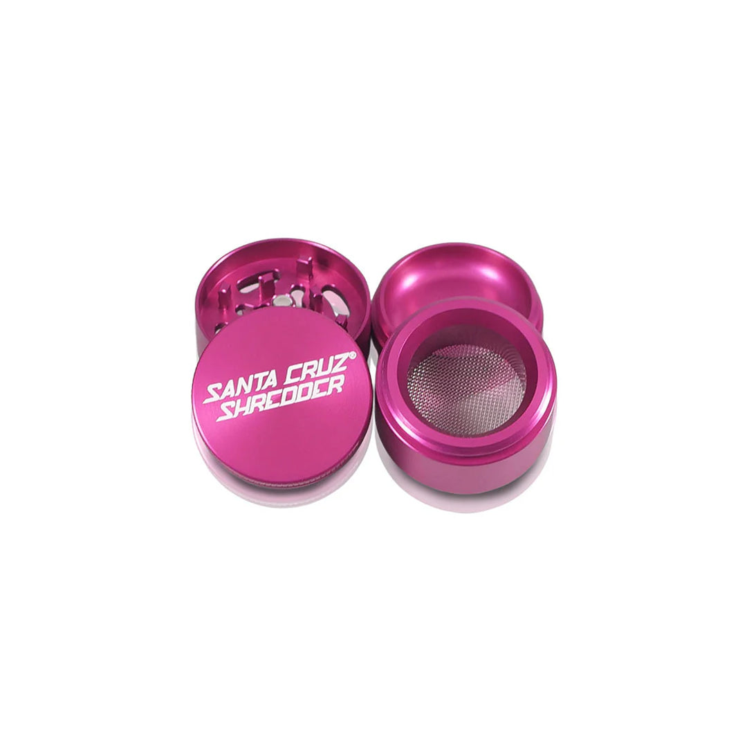 All four pieces of the Pink Santa Cruz Shredder 4-Piece Small Grinder laid open.