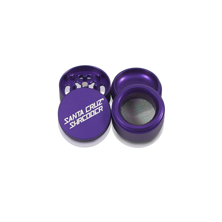 Four parts of the Purple Santa Cruz Shredder 4-Piece Grinder displayed open on white background.
