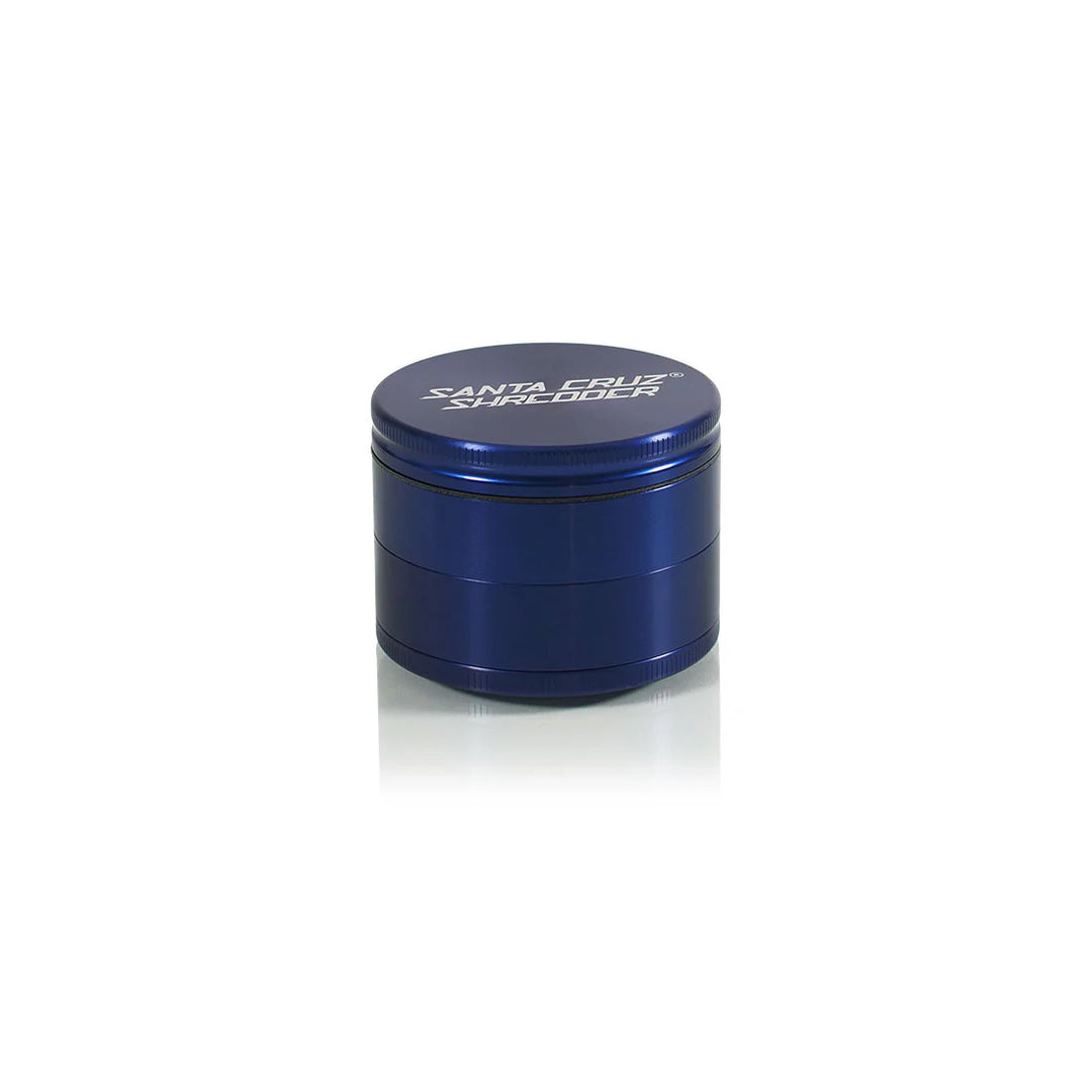 Side angle of Santa Cruz Shredder large herb grinder in navy blue aluminum finish