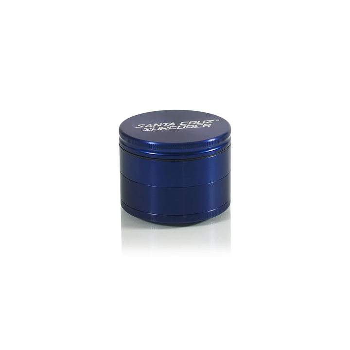 Side angle of Santa Cruz Shredder large herb grinder in navy blue aluminum finish