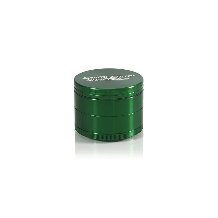 Green Santa Cruz Shredder large anodized grinder with open teeth view