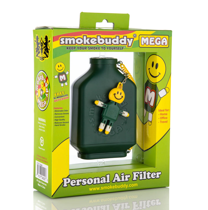 Angled box view of Smoke Buddy MEGA Green displaying product graphic, filter lifespan icons, and included travel caps.