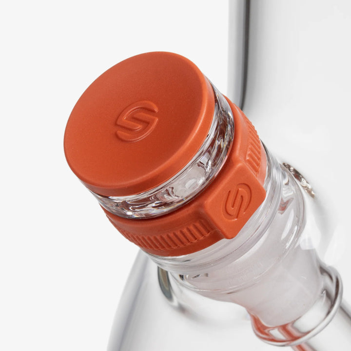 Detail of the silicone cap stored in the Sienna base foot of the Softglass Core Bong