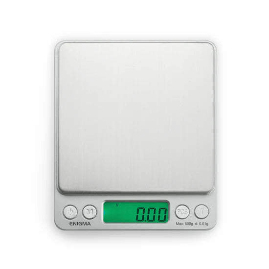 Truweigh Enigma digital scale front view powered on with green backlit LCD