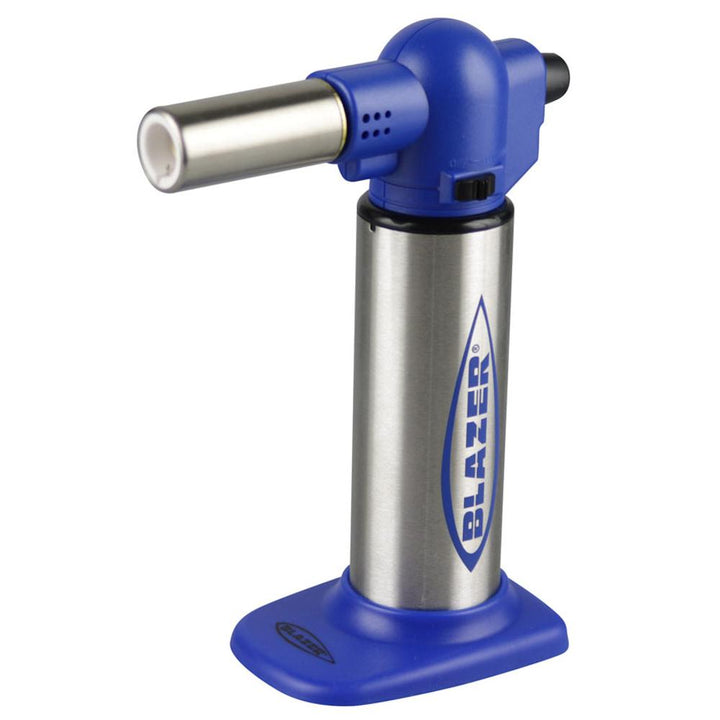 Side angle of Blazer Big Buddy Blue Torch showing ergonomic grip and safety lock switch
