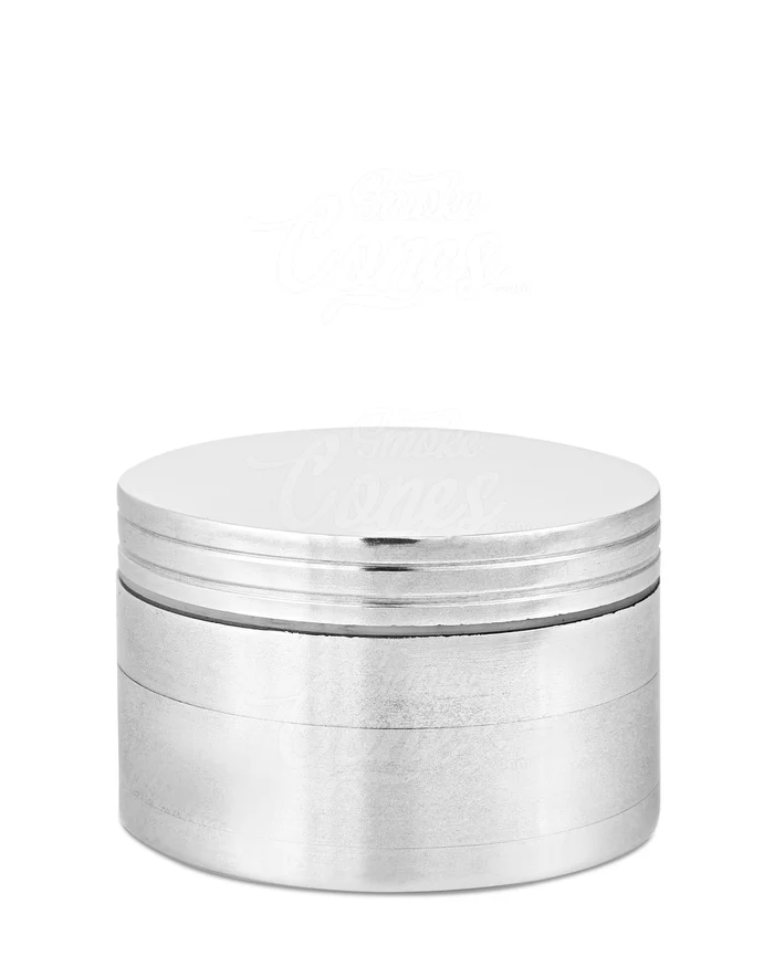 Closed aluminum grinder standing upright in full view