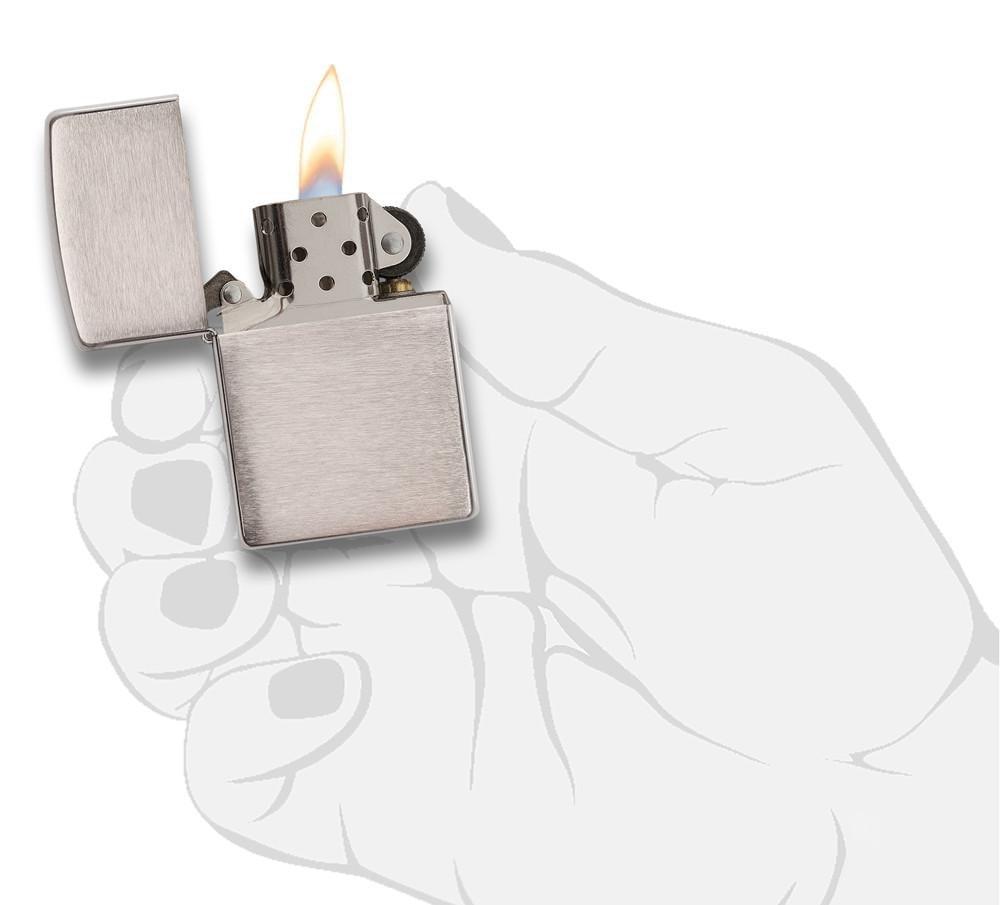 Zippo - Chrome Brushed Lighter with windproof flame, shown open in a hand illustration. Refillable and ideal for collectors.