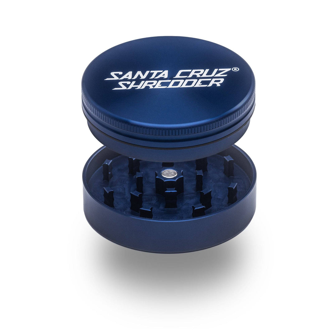 Blue Santa Cruz Shredder 2-Piece Large Grinder – magnetic top and sharp cutting teeth shown apart.