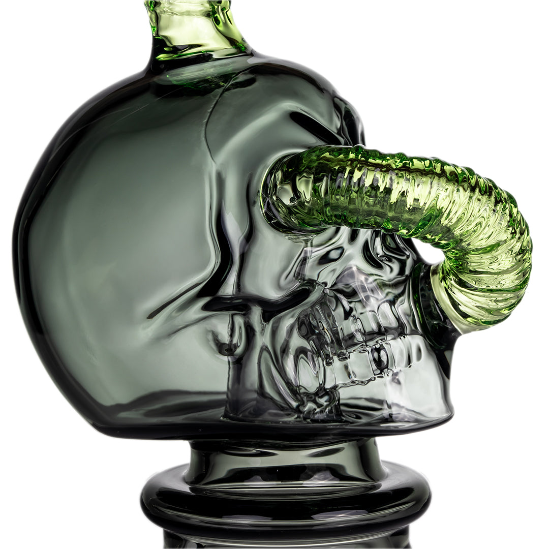 Close-up of Grim Ripper Peak Top green glass worm detail crafted from premium borosilicate glass