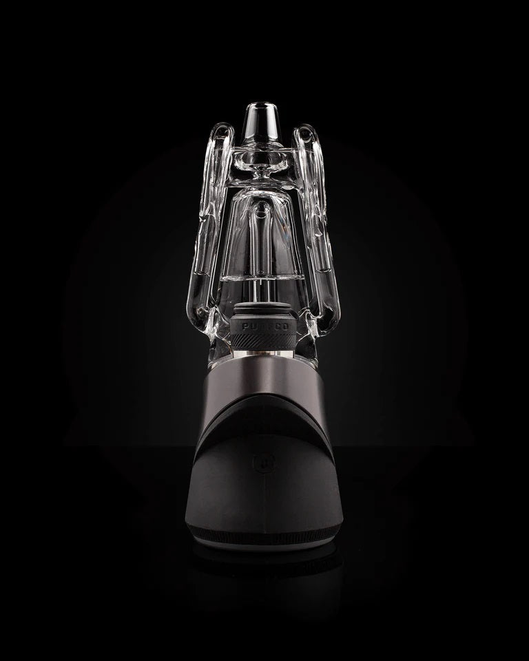 Puffco Ryan Fitt Recycler Glass 2.0 – standing upright on black backdrop, detailed airflow chamber visible.