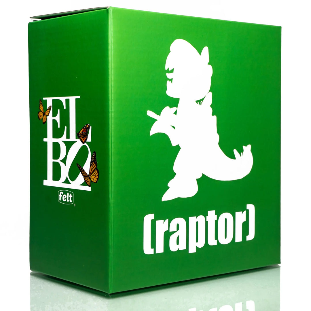 Elbo x Felt Raptor Vinyl Toy Green — green Raptor vinyl toy in box