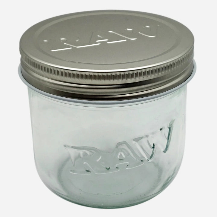 10 oz RAW glass jar with embossed logo and metal screw-on lid, ideal for airtight and smell-proof storage of herbs or contents.
