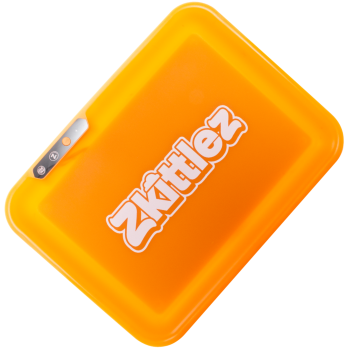Glow Tray x Zkittlez Rolling Tray Orange — glow-in-the-dark rolling tray in orange shown glowing in dark