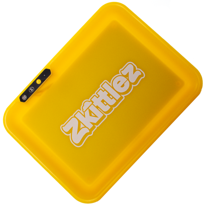 Glow Tray x Zkittlez Rolling Tray Yellow — glow-in-the-dark rolling tray in yellow shown glowing in dark