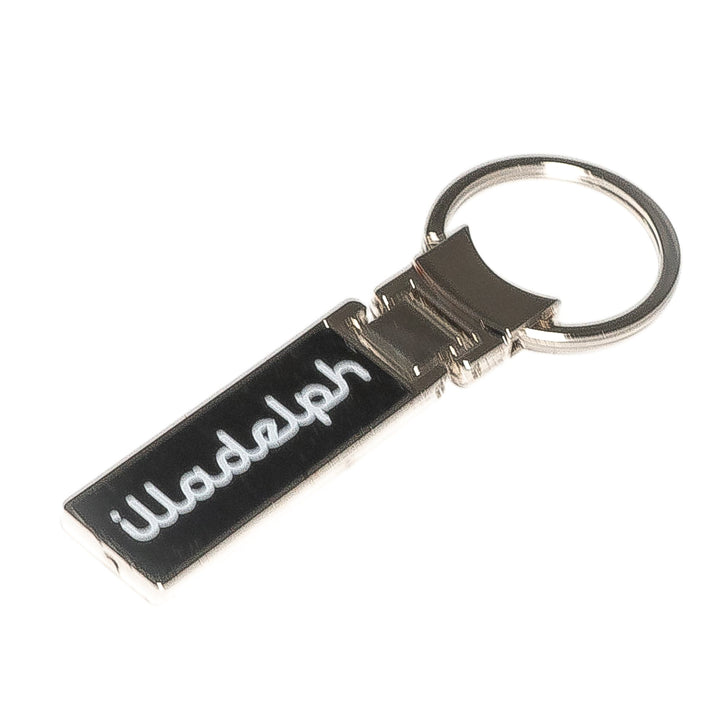 Illadelph Glass carbon fiber key ring side view of stamped detail