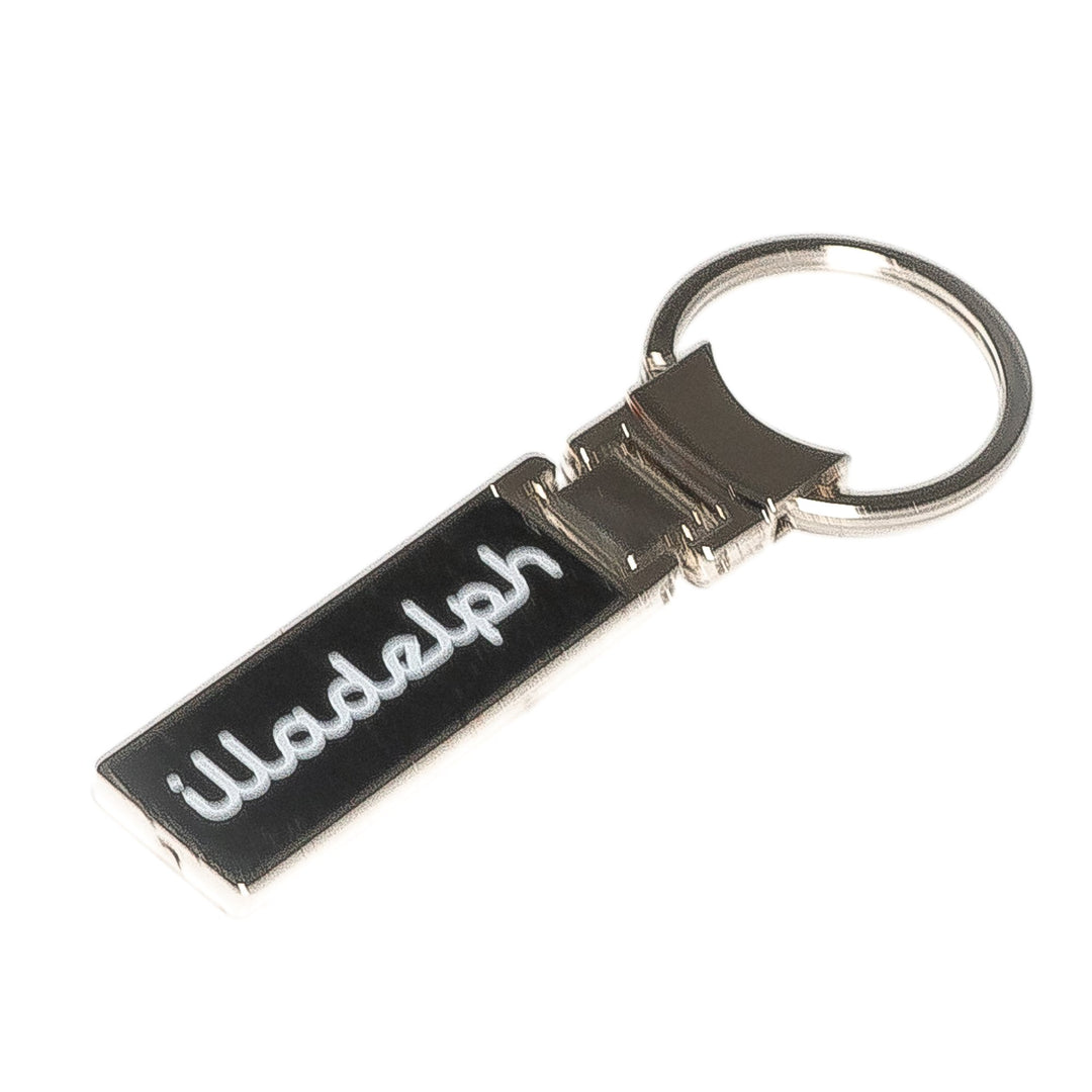 Illadelph Glass carbon fiber key ring side view of stamped detail