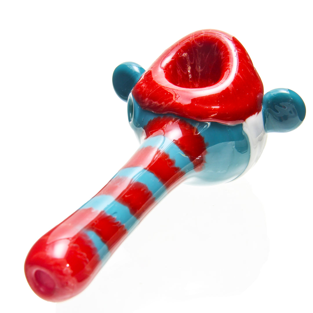 Jedi Glassworks Poppa Smurf Spoon Pipe — Poppa Smurf themed glass spoon pipe shown from alternate angle