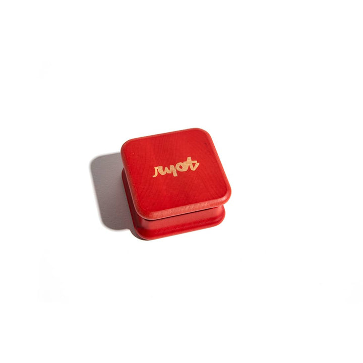 RYOT x Chocolate 2 Piece Maple Wood Grinder Red — red maple wood grinder from alternate angle