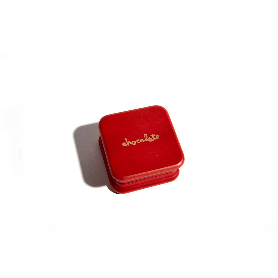 RYOT x Chocolate 2 Piece Maple Wood Grinder Red — red maple wood grinder top-down view