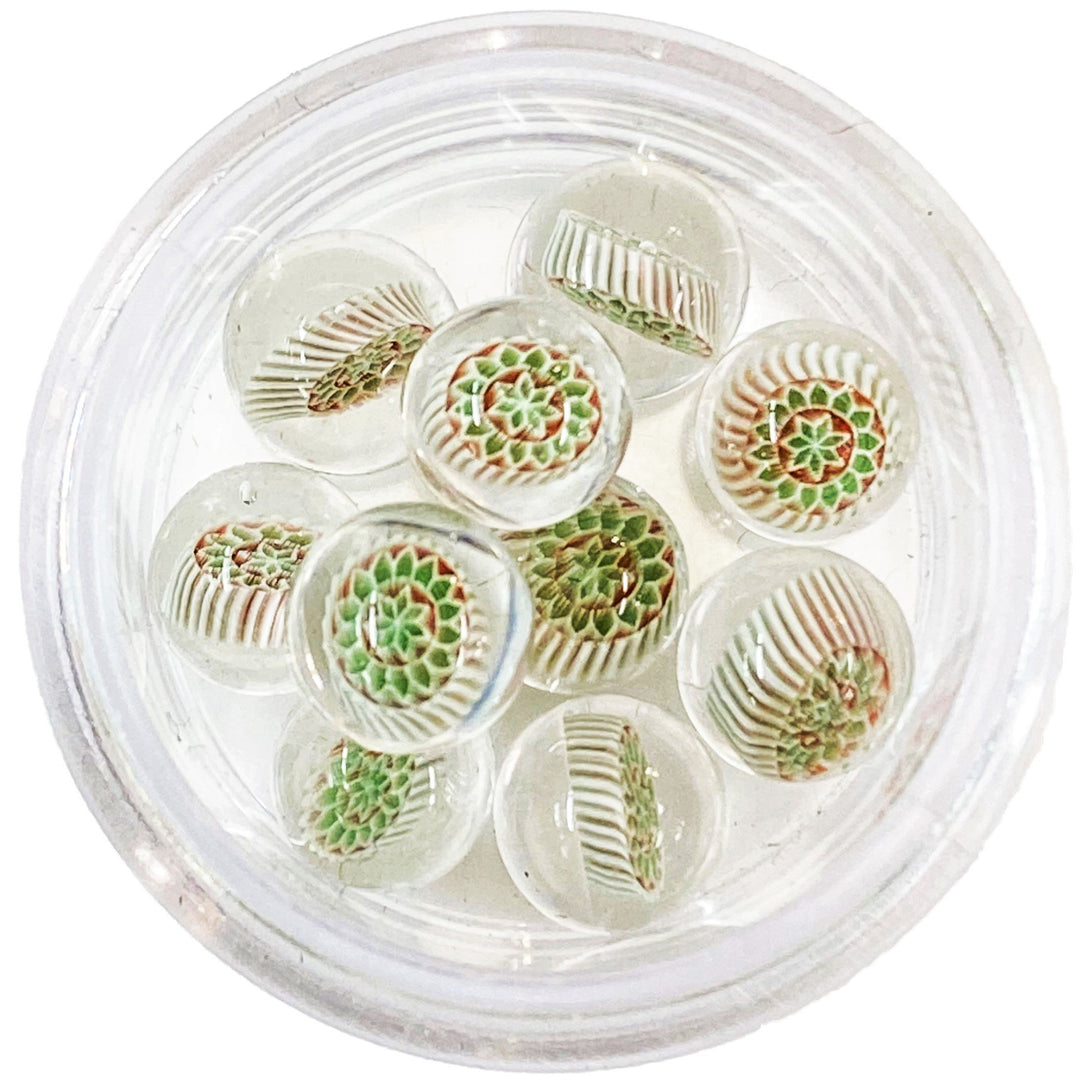 Steve H Glass Milli Terp Pearl Red and Green Star Burst — milli-decorated terp pearl with red and green star-burst pattern